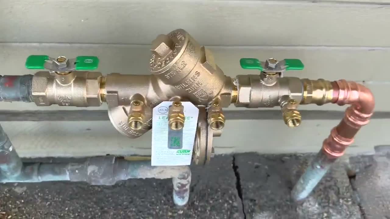 A newly installed backflow preventer assembly, live job footage.