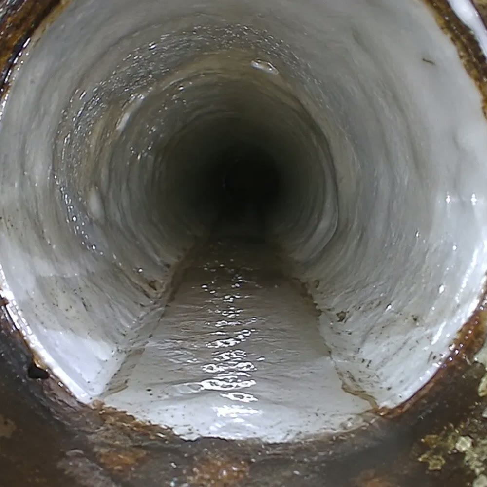 Pipe Lining, a cured liner inside the old pipe.