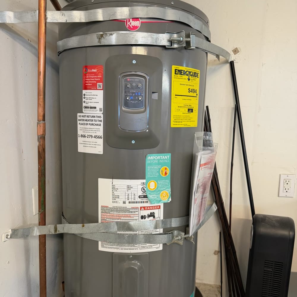 Electric water heater installed.