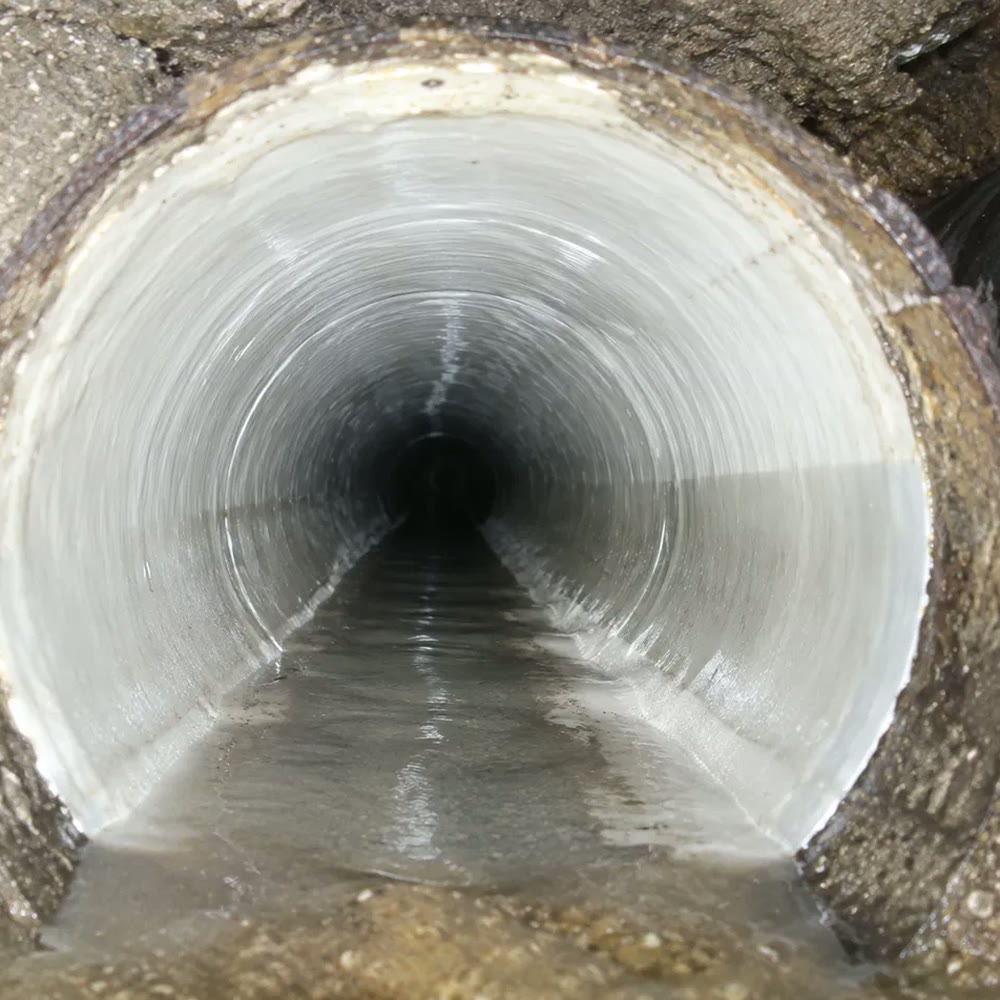 Pipe Lining, a new liner set inside the old host pipe.
