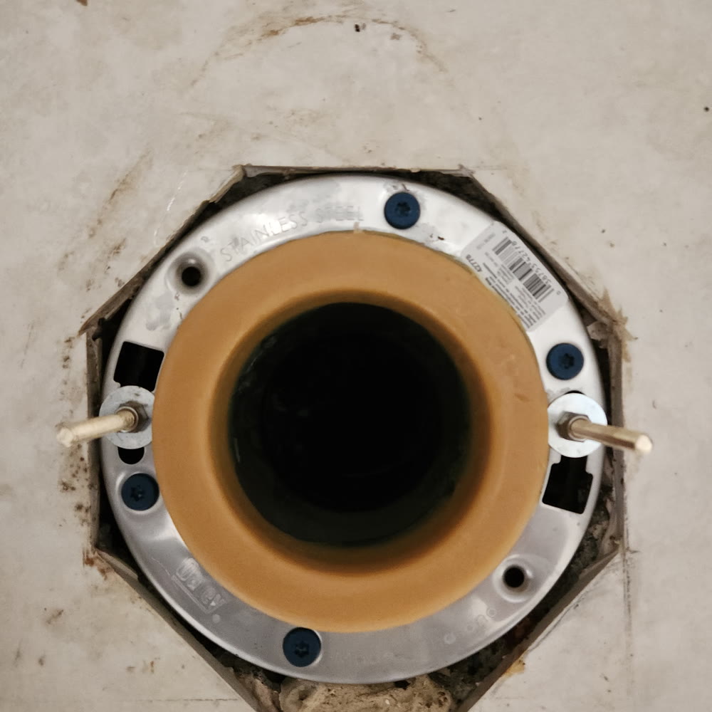 New wax ring on a toilet flange.