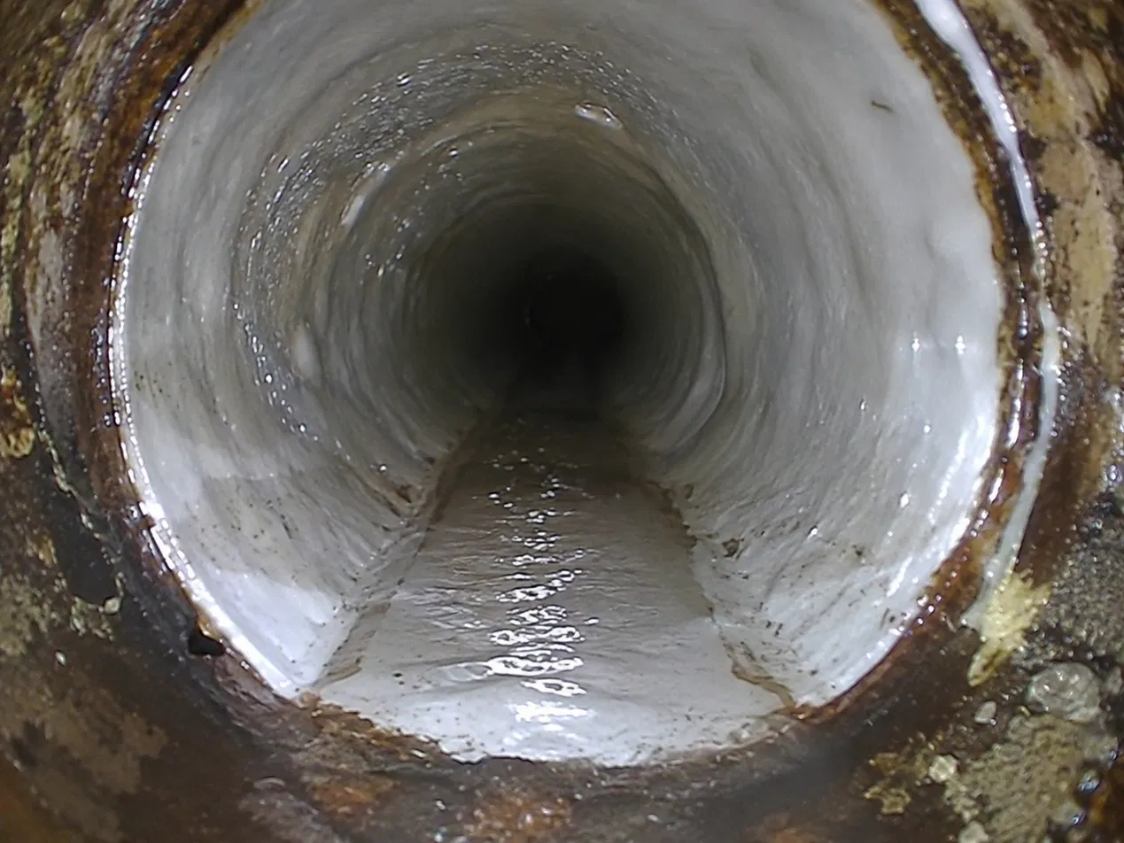 Pipe Lining, the liner cured smooth inside the pipe.