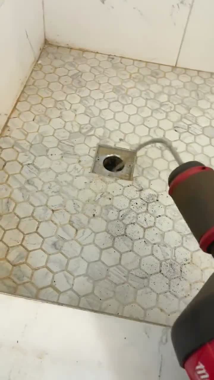 Snaking a shower drain, live job footage.