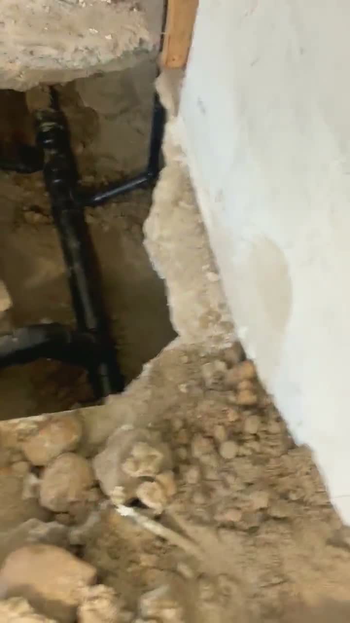 New drain lines in a commercial slab trench, live job footage.